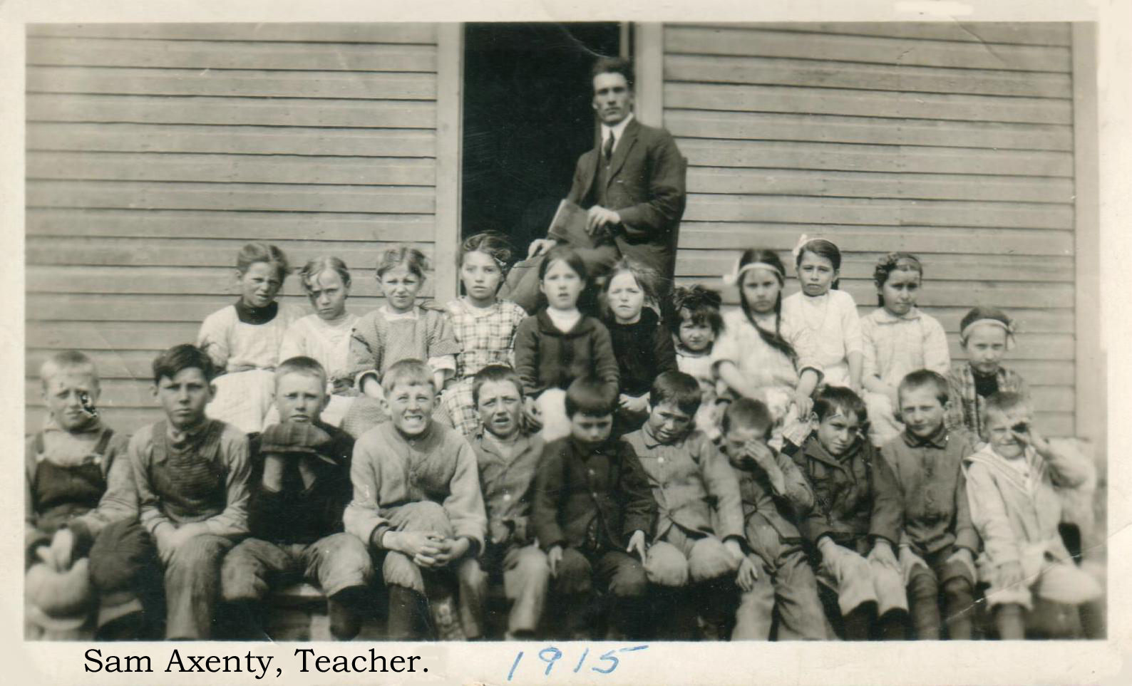 A Class photo in 1915 of a one room school house in Saskatchewan with Sam Axenty as the school teacher, A Class photo in 1915 of a one room school house in Saskatchewan with Sam Axenty as the school teacher,FOX HILLS 	School District # 190, 	1910 Organised, 1912 Classes, 	SW of SE 	14 	Township 24 	Range 16 	W of the 2 nd Meridian, 	near Fox Hills, 	  	P.O. SE Section 14 Tsp 24 Rge 16 W2,     SASKATCHEWAN, CANADA